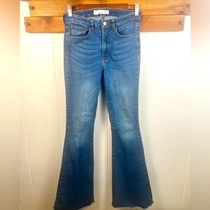 Fit and Flare, Bell distressed hem West & Wild (Big R) blue jeans